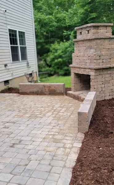 Custom yard cleanup service with custom design in Raleigh, NC by Lindsay Lawn And Landscaping