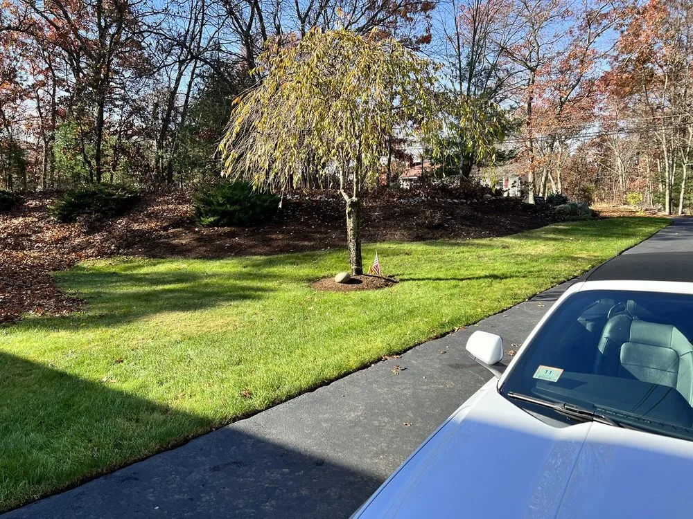 Professional outdoor landscaping for homes in Foxborough, MA by Linex Property Care