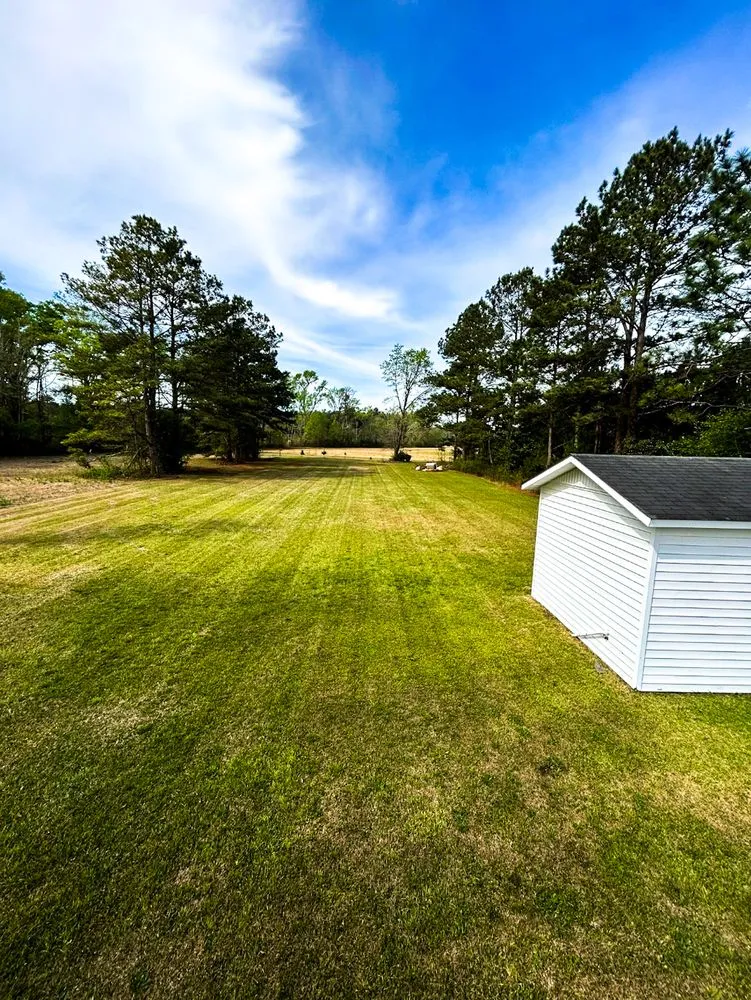 Professional lawn mowing service for outdoor upgrades in Florence, SC by Linhale Landscaping & Lawn Care