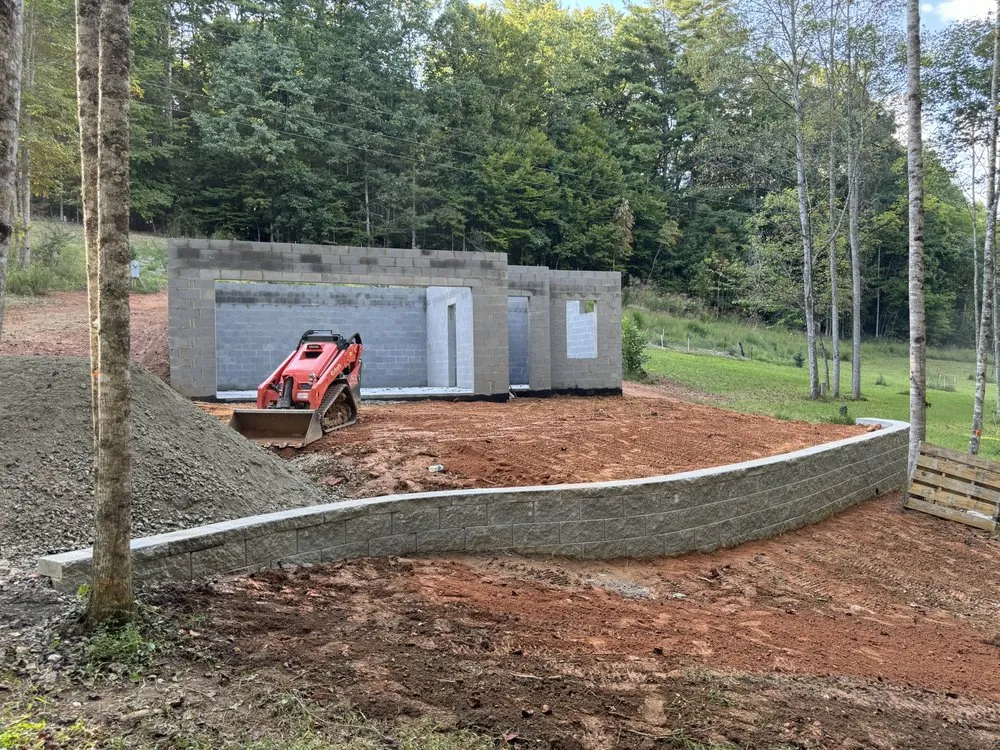 Professional lawn mowing service for year-round maintenance across Flat Rock, NC - Lion Stone Construction