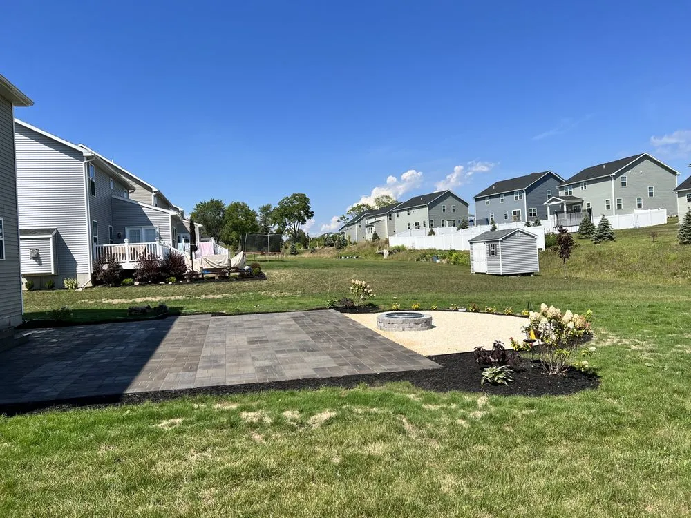 Professional outdoor landscaping with custom design across Churchville, NY - Lions Den Landscaping & Maintenance