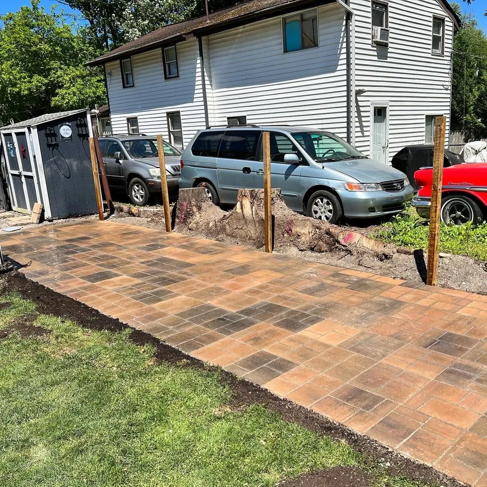 Reliable lawn mowing service for outdoor upgrades across Churchville, NY - Lions Den Landscaping & Maintenance