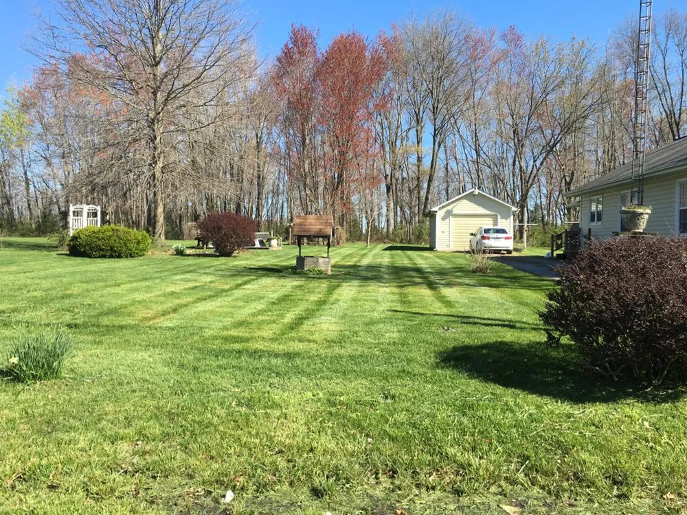 Affordable yard maintenance in Fairfield, IL by Liquid Green Lawn Solutions