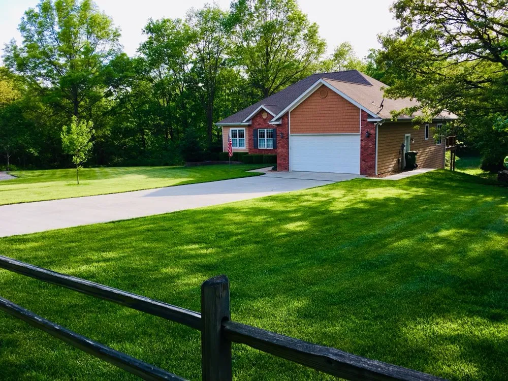 Custom lawn mowing service for outdoor upgrades in Fairfield, IL by Liquid Green Lawn Solutions