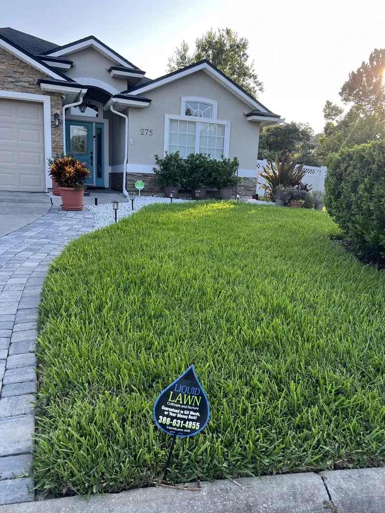 Professional lawn care service with custom design in Daytona Beach, FL by Liquid Lawn