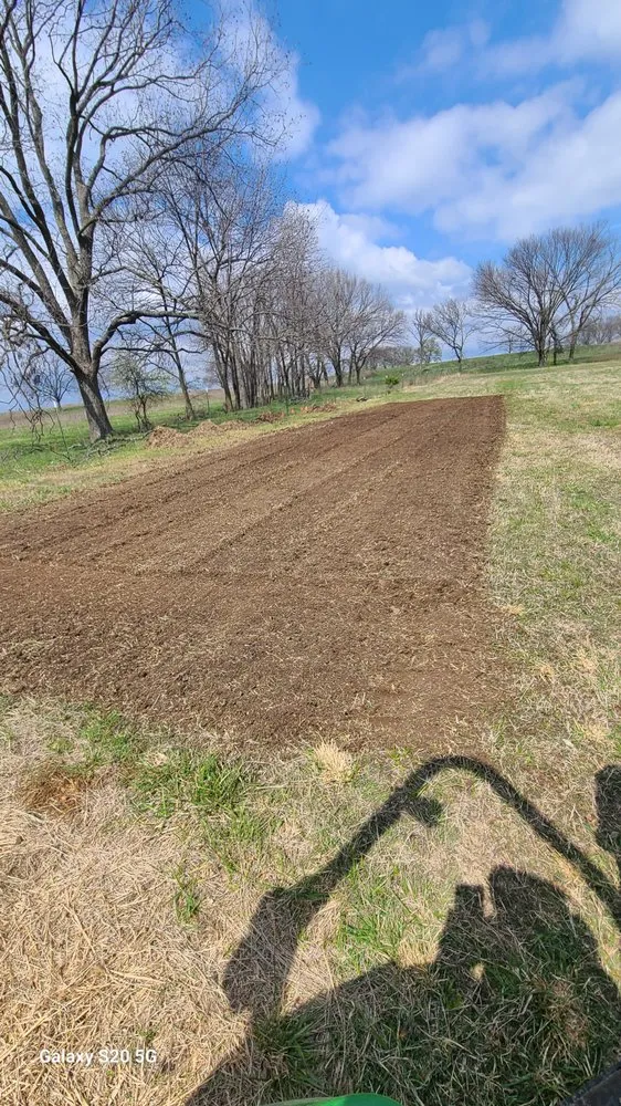 Local residential landscaping in Okmulgee, OK by Little Green Machine Tractor