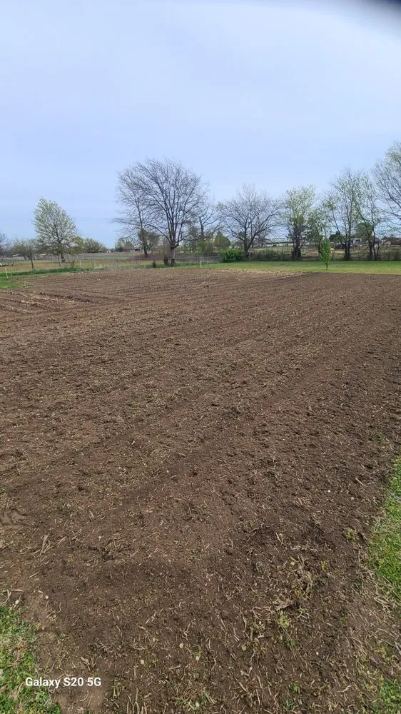 Custom yard cleanup service experts serving Okmulgee, OK - Little Green Machine Tractor