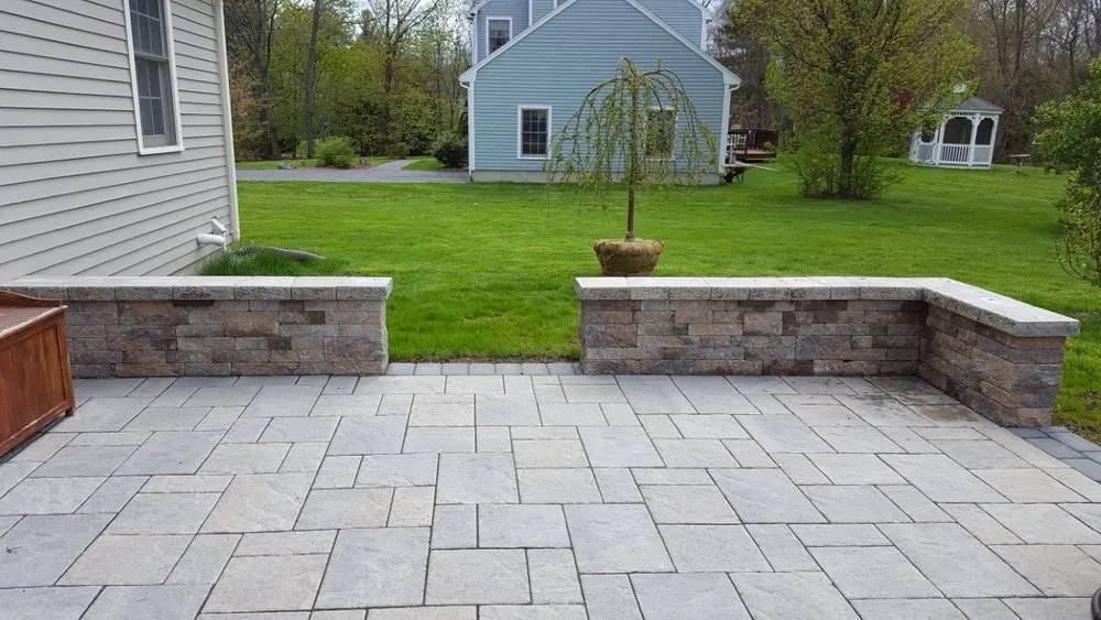 Custom landscape design for outdoor upgrades in Littleton, MA by Littleton Earthworks