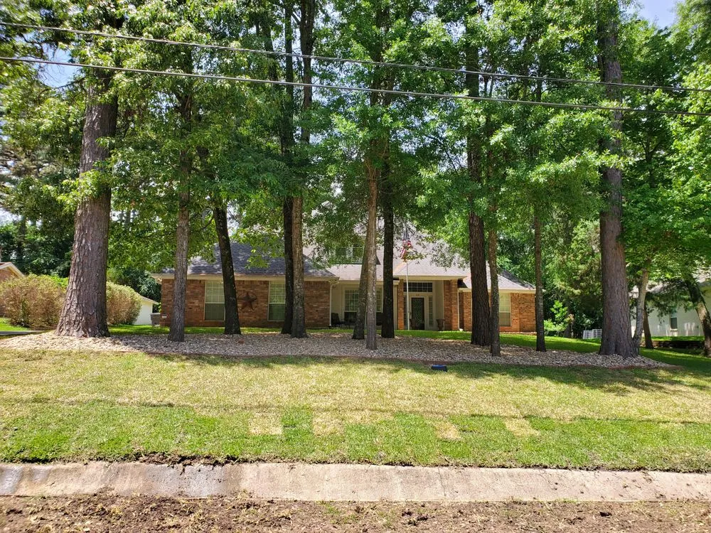 Custom residential landscaping with custom design in Flint, TX by Littlewild Landscaping