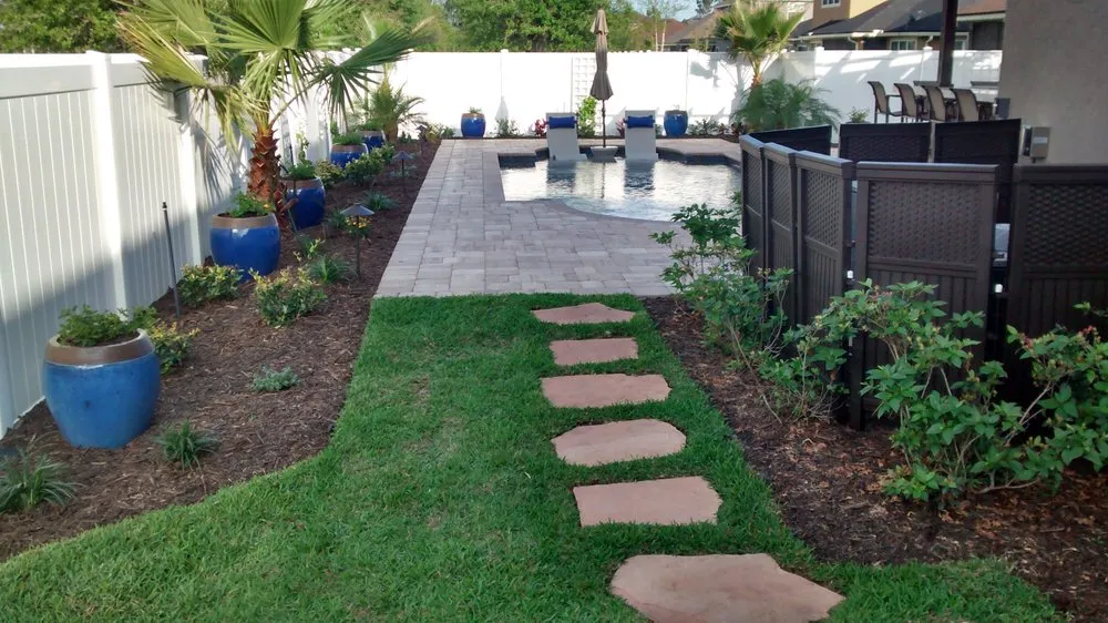 Professional lawn mowing service for homes in St. Augustine, FL by Live Aloha Landscapes