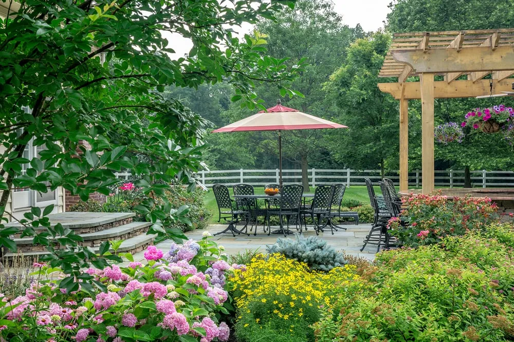 Custom landscape installation for residential properties in Reisterstown, MD by Live Green Landscape Associates