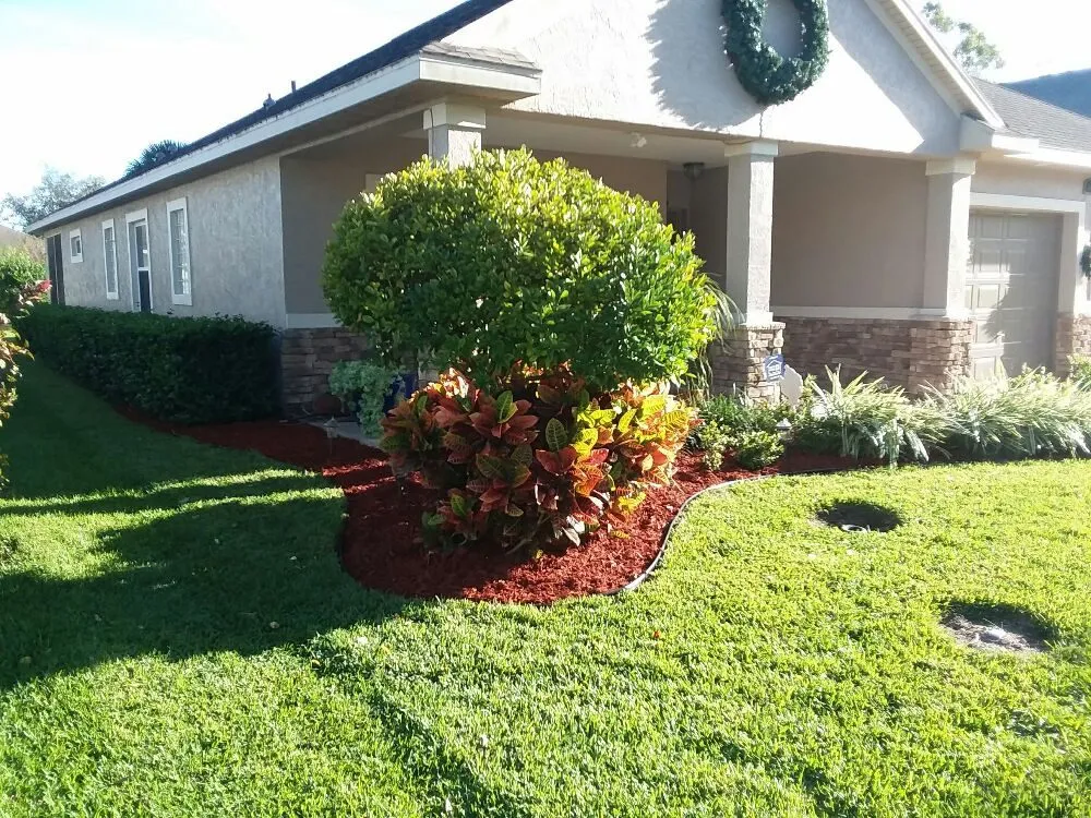 Local yard cleanup service with custom design in Mims, FL by Live Love Grow From the Ground Up