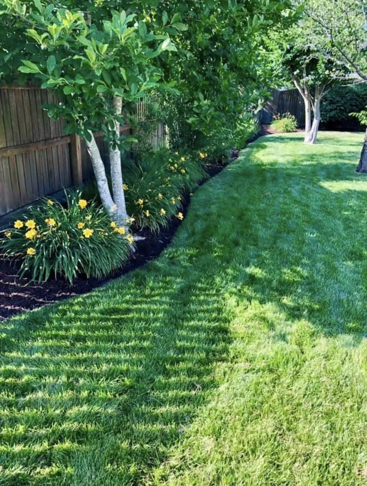 Custom landscape installation for outdoor upgrades in Chesapeake, VA by Liverman Lawn & Landscaping