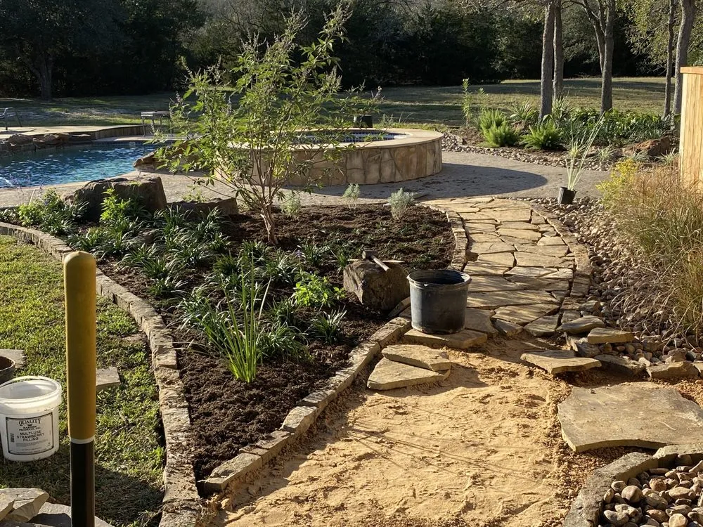 Reliable lawn mowing service with custom design in Edinburg, TX by Living Color