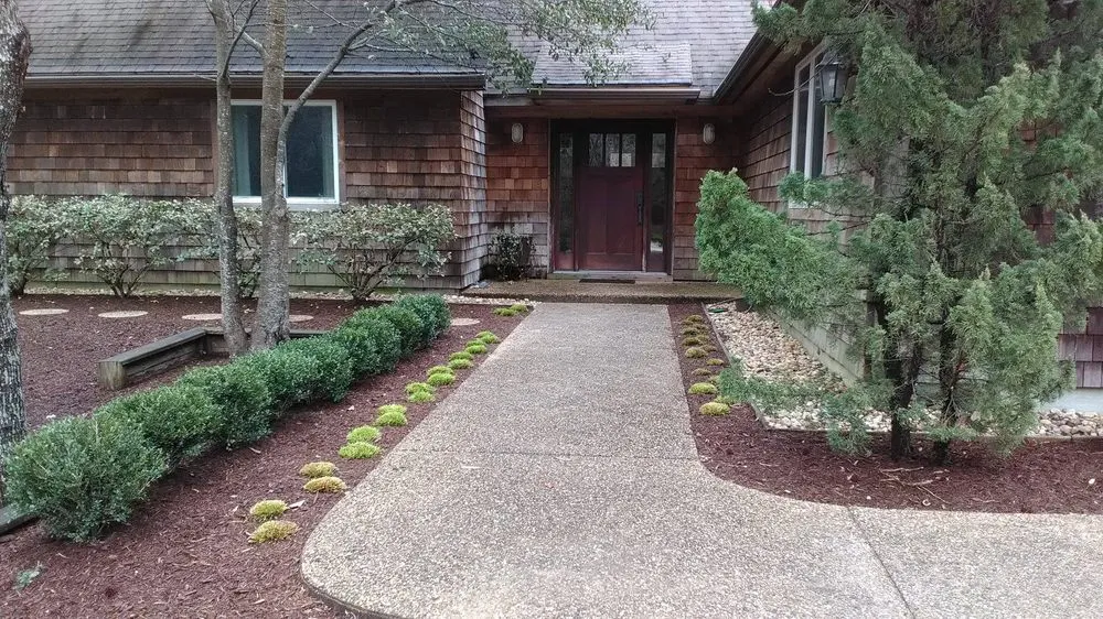 Trusted yard maintenance for beautiful yards in Powells Point, NC by Living Oaks Landscaping & Tree Services