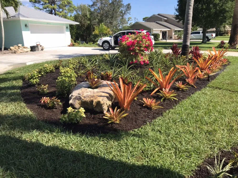 Local lawn mowing service with custom design in Palm City, FL by Living Water Landscape