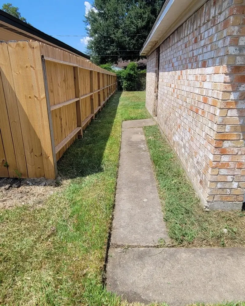 Expert lawn care service in Houston, TX by Living With Soil Landscaping