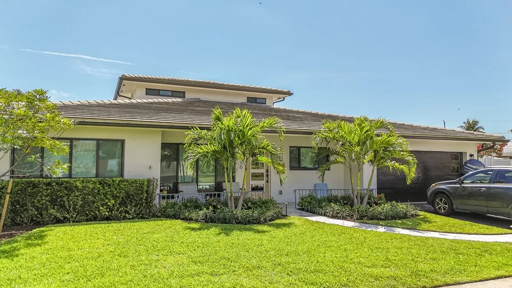 Reliable lawn care service for residential properties in Oakland Park, FL by Livingston Landscapes