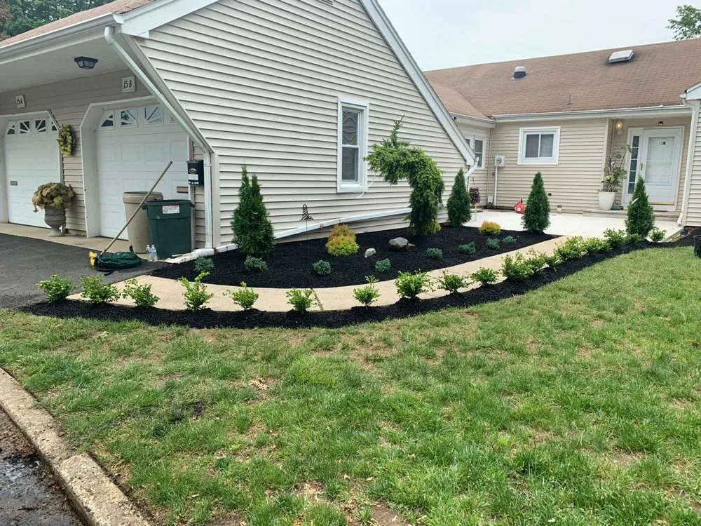 Professional lawn mowing service for year-round maintenance in Freehold, NJ by L&J Landscaping and Painting