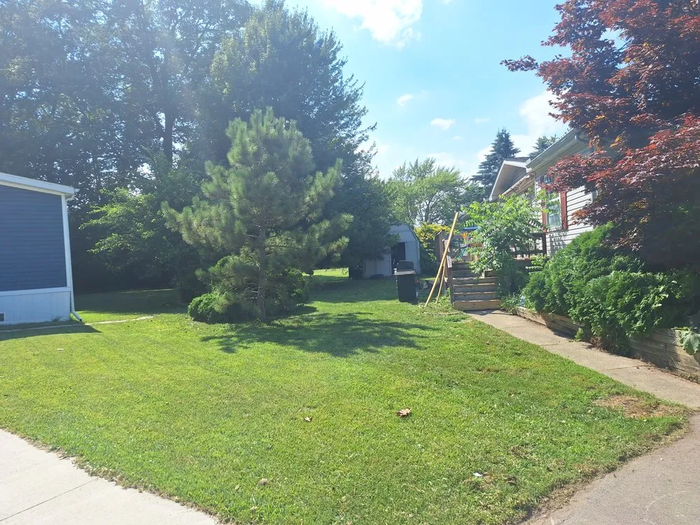 Expert outdoor landscaping for homes in Monroe, MI by L&L Lawncare&Snow Removal