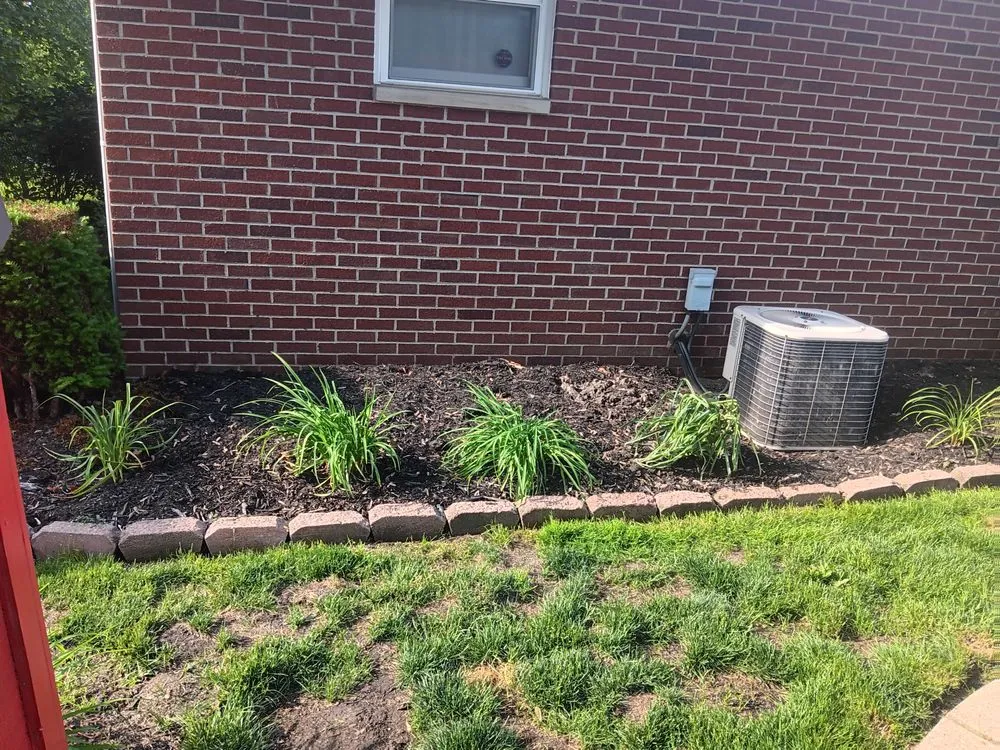 Trusted lawn mowing service for residential properties in Akron, OH by lloyds landscaping