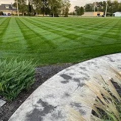 Custom landscape installation for homes in Grand Forks, ND by Lloyd's Lawn Care