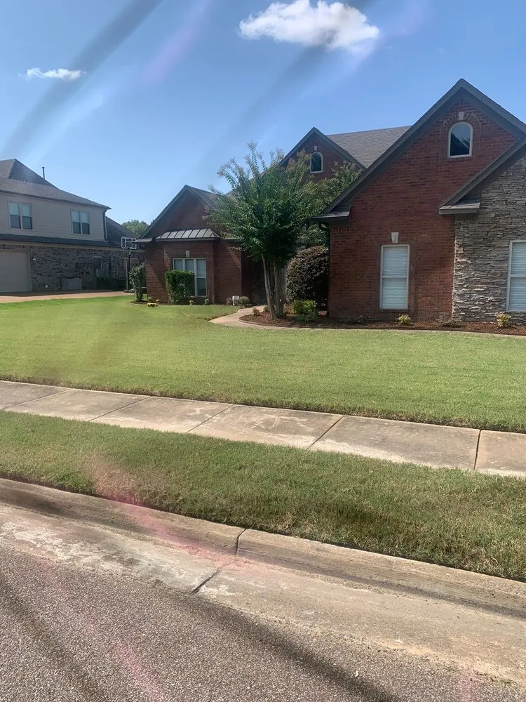 Professional landscaping services for residential properties in Arlington, TN by Lloyd’s Lawn Care Service