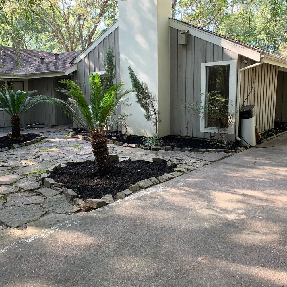 Custom garden landscaping for beautiful yards in Houston, TX by Lls & Construction Grp