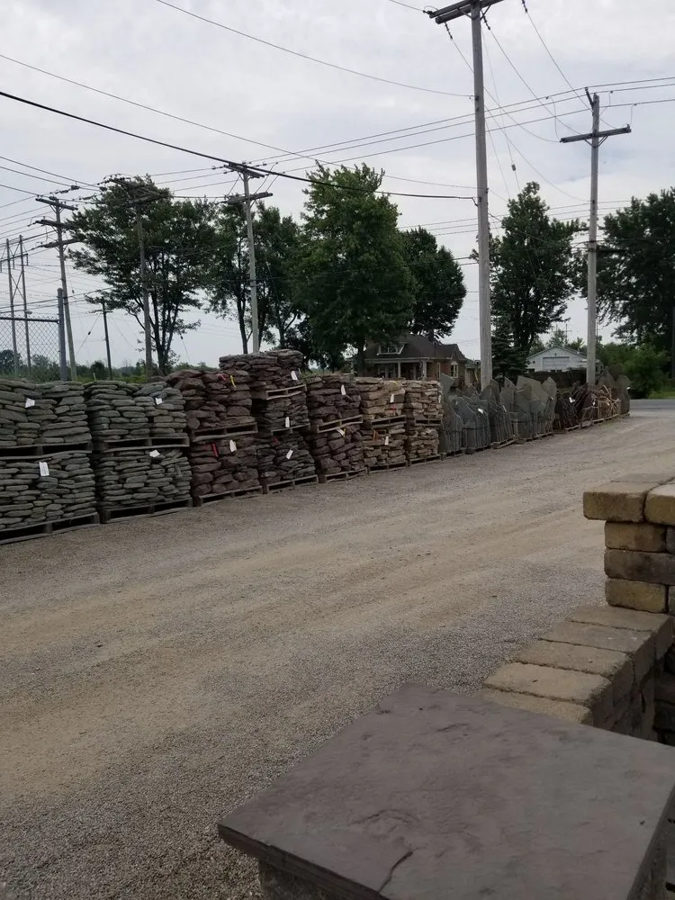 Custom garden landscaping for residential properties in Alden, NY by LM Stone and Topsoil Services