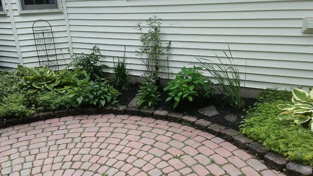 Custom yard maintenance for homes in North Tonawanda, NY by LMG property management Call My Gardener