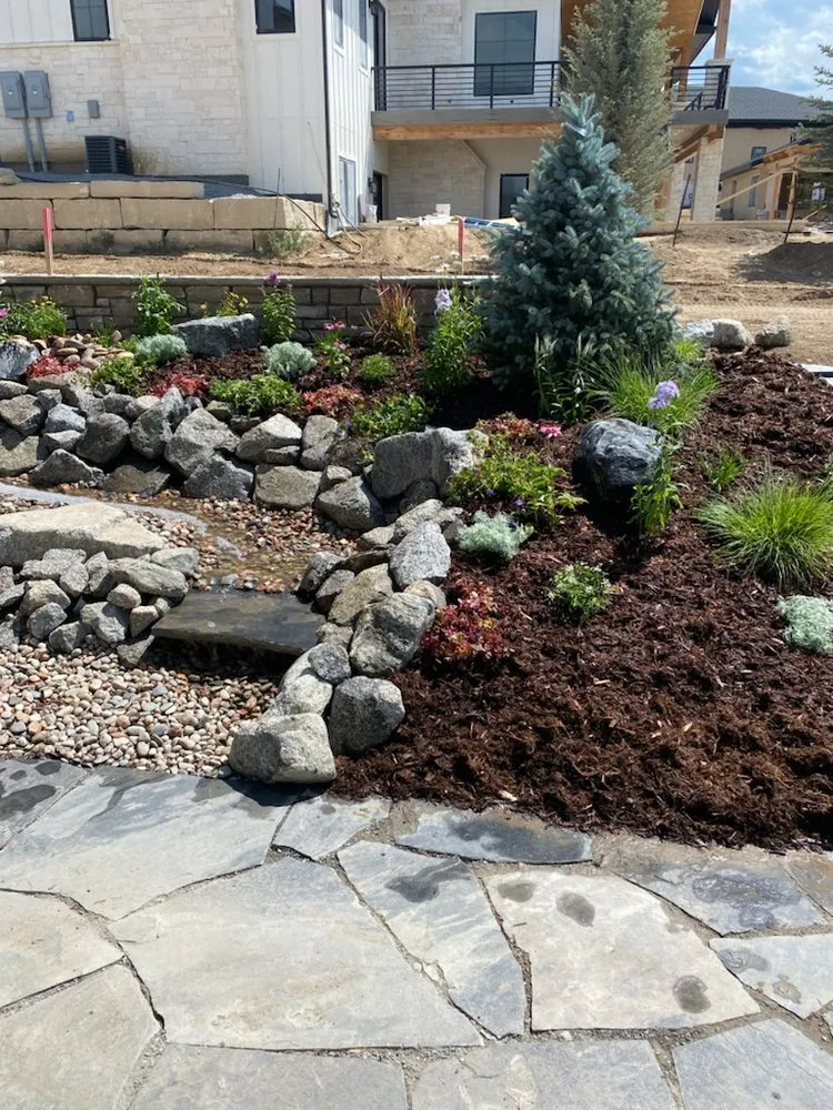 Custom landscape design for residential properties in Longmont, CO by LO CO Lawn & Landscaping