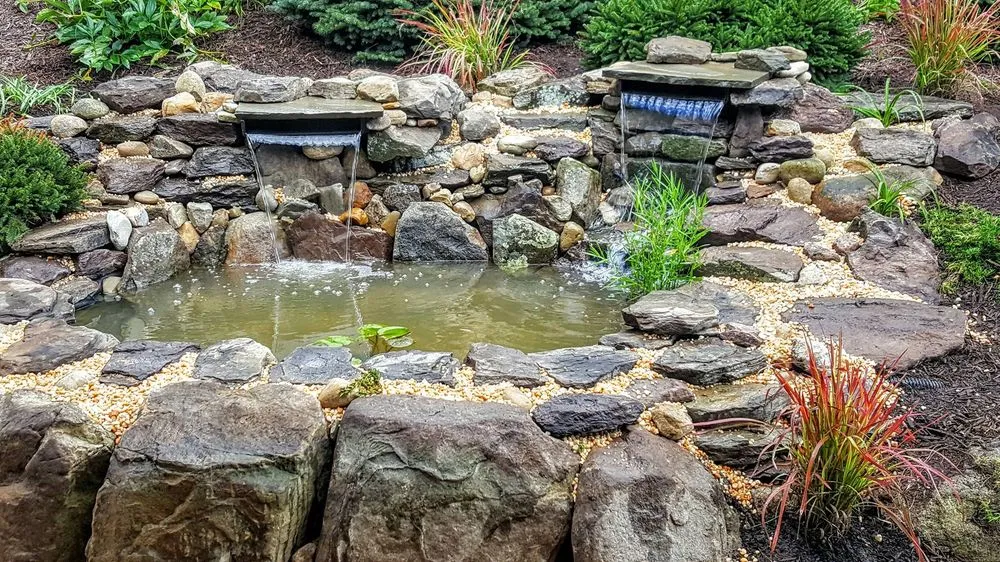 Professional lawn mowing service for residential properties in Monroeville, PA by Lo Tito Landscape and Construction