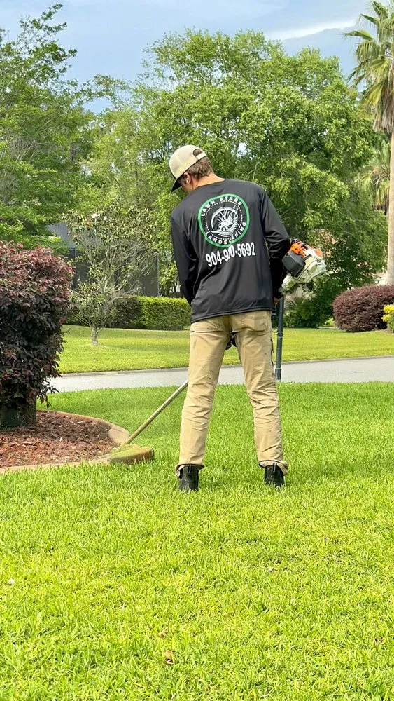 Custom lawn mowing service with custom design across Orange Park, FL - Local Boys Lawncare