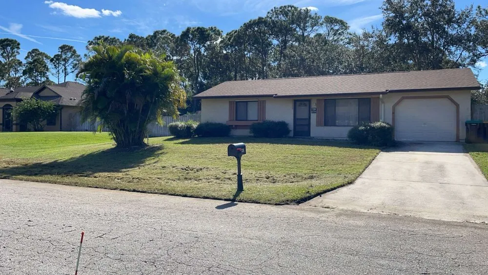 Professional lawn mowing service near you in Palm Bay, FL by Local Roots Property Maintenance