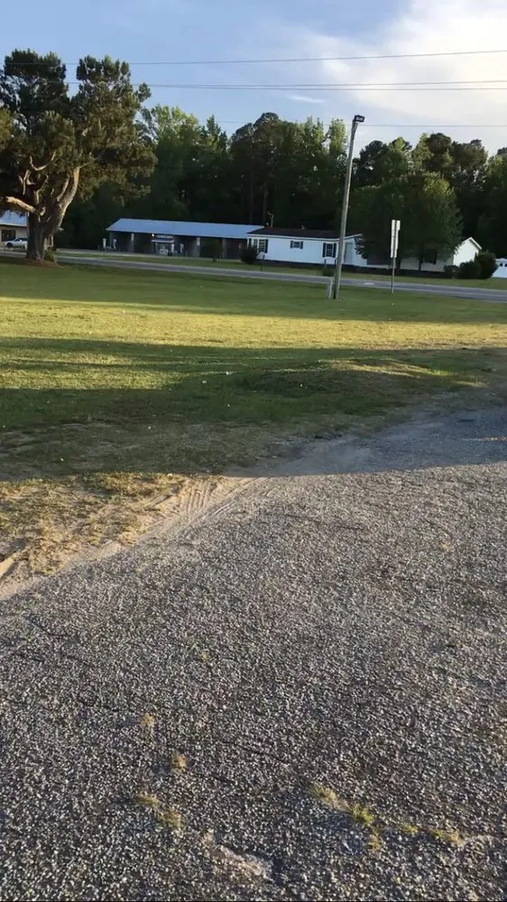 Professional landscaping services for residential properties in Lumberton, NC by Locklears Lawn Care