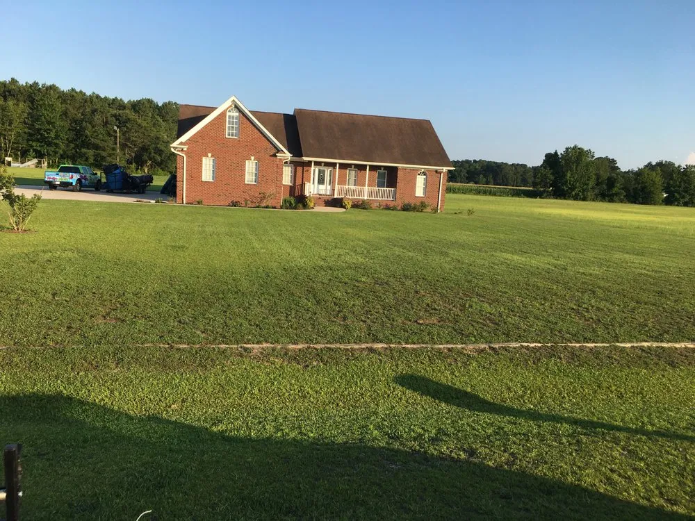 Professional yard maintenance for residential properties in Lumberton, NC by Locklears Lawn Care