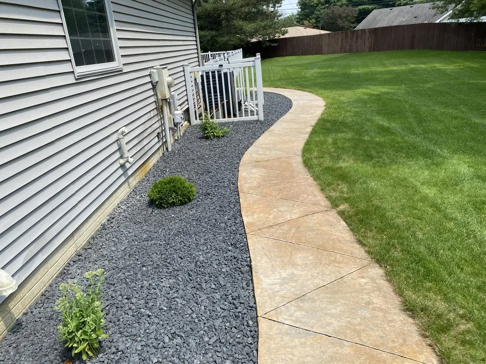 Custom lawn mowing service in Lambertville, MI - Logan’s Logs & Landscape