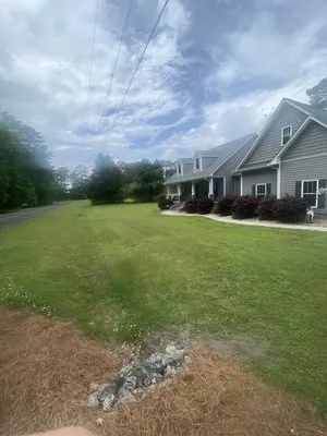 Logan’s Mowing and Edging Logo