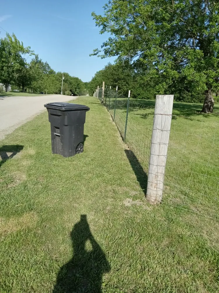 Professional yard cleanup service for homes across Bates City, MO - Logans Push Mowing And Weedeating.