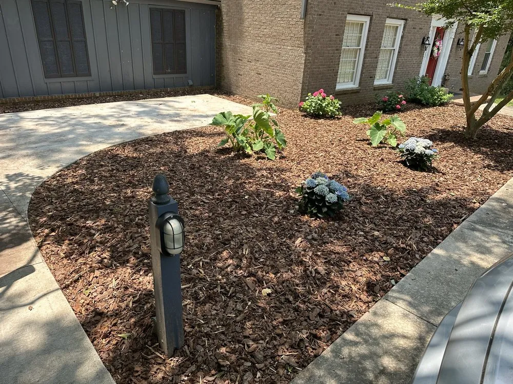 Expert landscaping services for residential properties in Greensboro, NC by London Landscaping