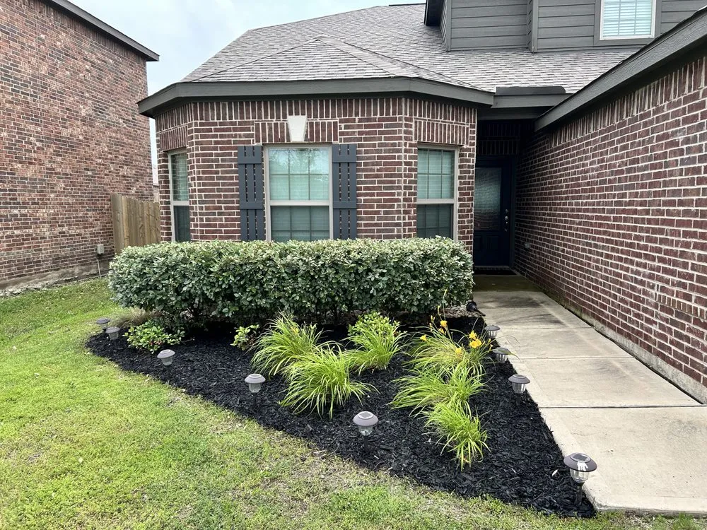 Custom lawn mowing service for residential properties in Fort Worth, TX by Lone Star Custom Outdoors