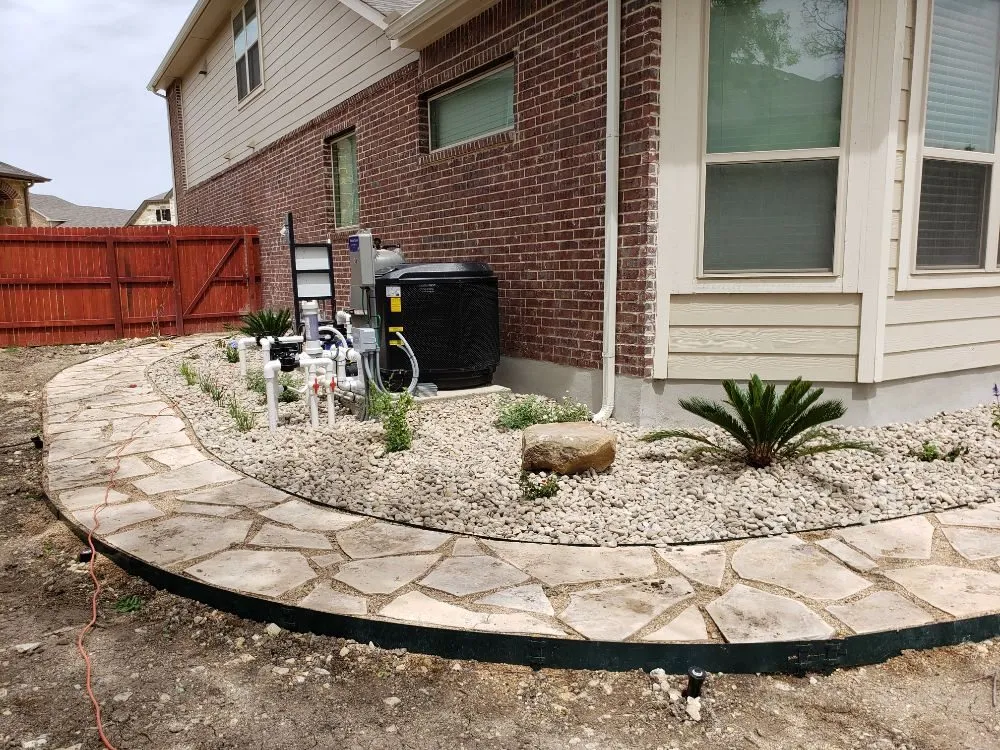 Expert outdoor landscaping for residential properties in San Antonio, TX by Lone Star Landscaping and Tree Service
