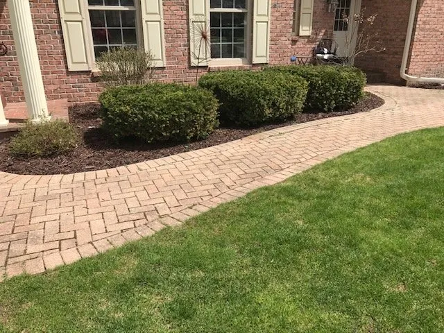 Custom yard cleanup service for beautiful yards in Green Bay, WI by Lonestar Landscaping