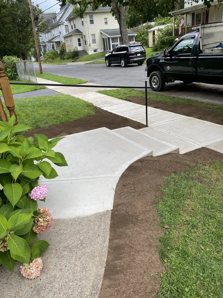 Trusted lawn mowing service for year-round maintenance across Auburn, NY - Long Point Masonry