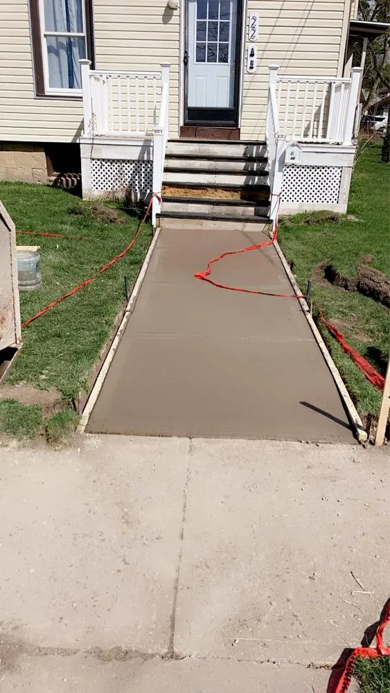 Affordable lawn care service for homes across Auburn, NY - Long Point Masonry