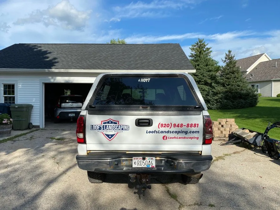 Affordable yard cleanup service for beautiful yards in Fond Du Lac, WI by Loof's Landscaping