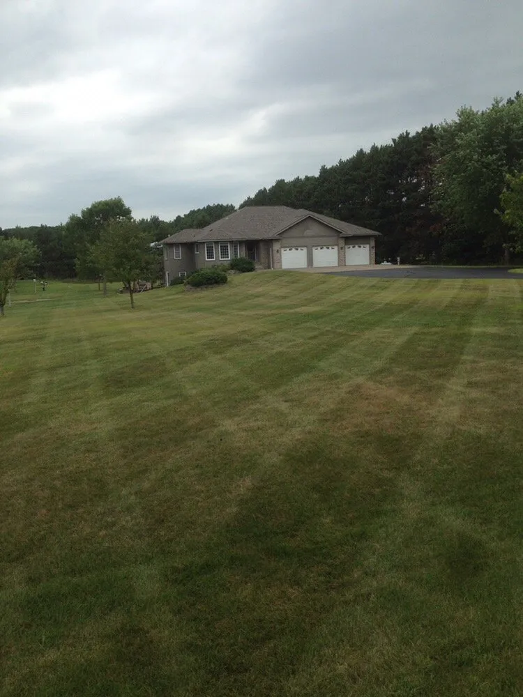 Expert lawn mowing service for homes in Royalton, MN by Looking Good Lawn & Landscape Maintenance