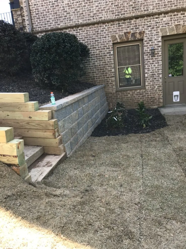 Custom lawn mowing service for residential properties in Dacula, GA by Lopez Landscape Construction