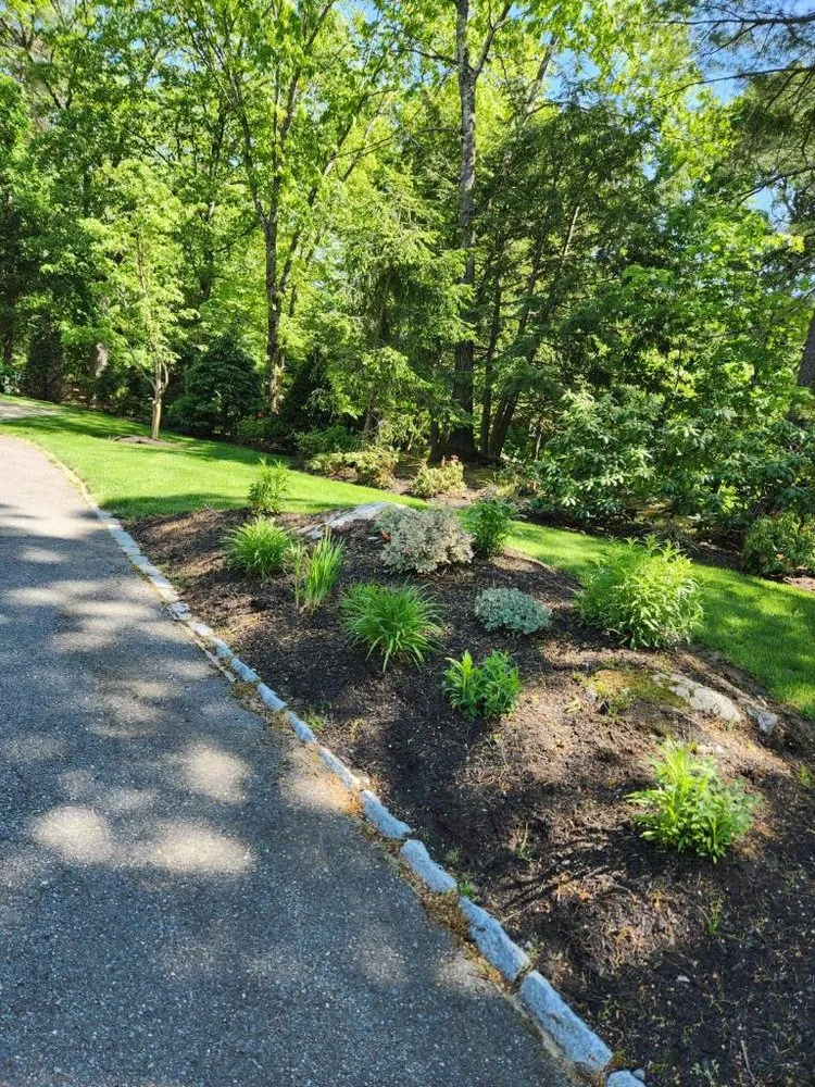 Custom lawn mowing service in Bellingham, MA by Lopez Landscaping Full Services