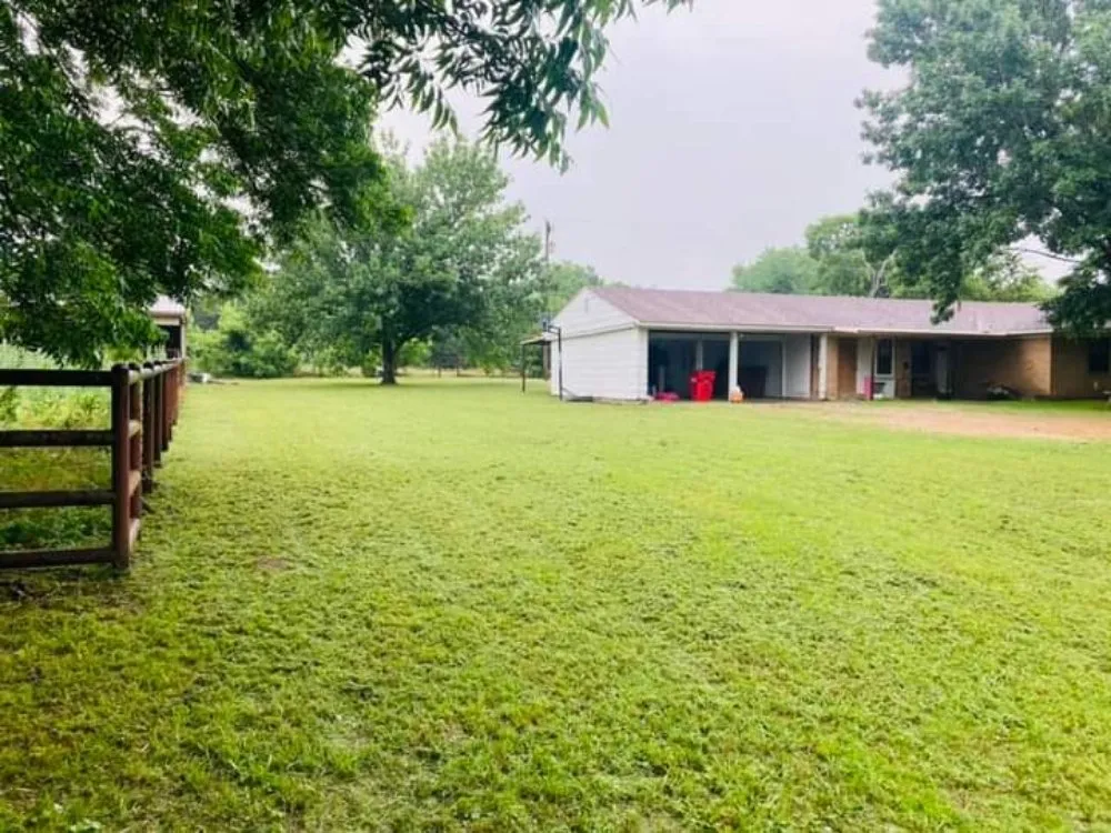 Custom garden landscaping in Knollwood, TX by Lopez Lawns & Landscaping